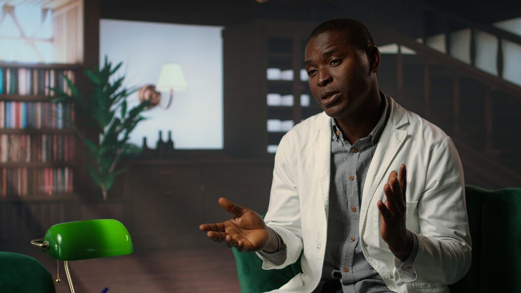 Doctor in white coat opening up about his medical career struggles